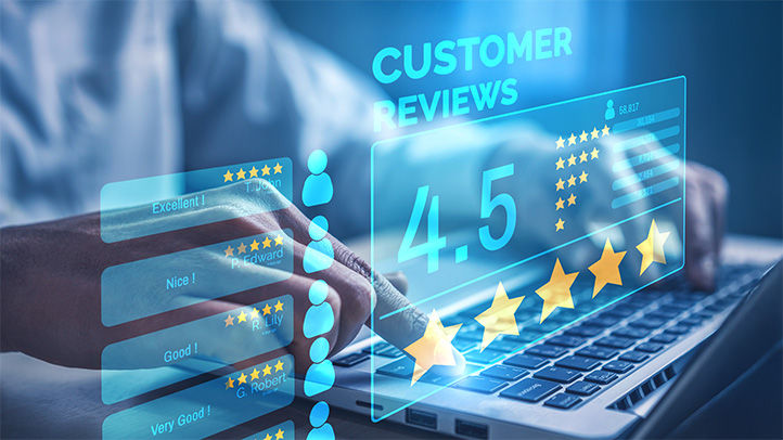 A person looking a customer reviews on a laptop